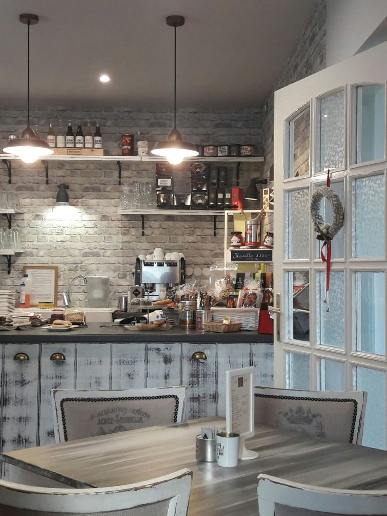 Functional home bar area with stylish shelving and organized glassware