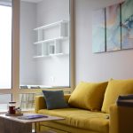 Modern living room with neutral shades creating a calm and serene atmosphere”