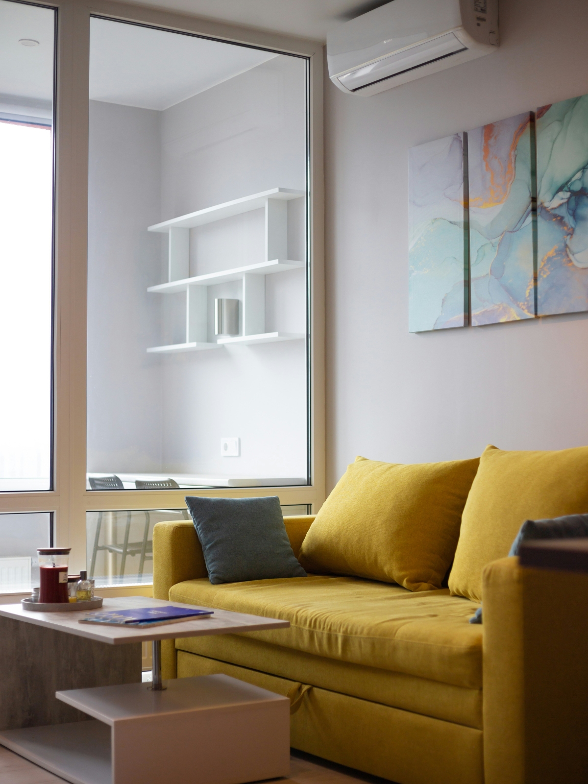 Modern living room with neutral shades creating a calm and serene atmosphere”