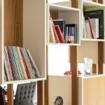 Organized seasonal decor storage bins labeled by season