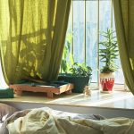 Cozy winter room décor with chunky knit blankets and warm textured fabrics