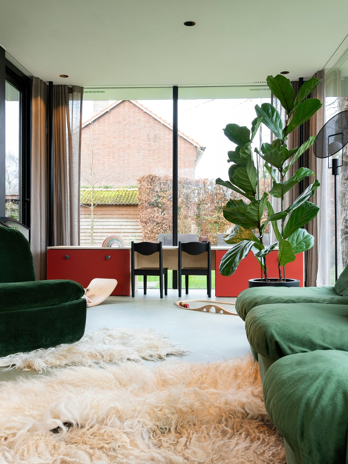 Large area rug defining a living space in an open-plan home