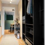 Slim wall-mounted shelves and storage for a narrow hallway
