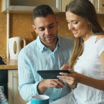 Modern smart home gadgets including smart lighting, thermostat, and voice assistant improving daily convenience in a contemporary home