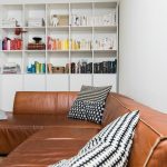 Modern storage-friendly coffee table with hidden compartments in a small living room