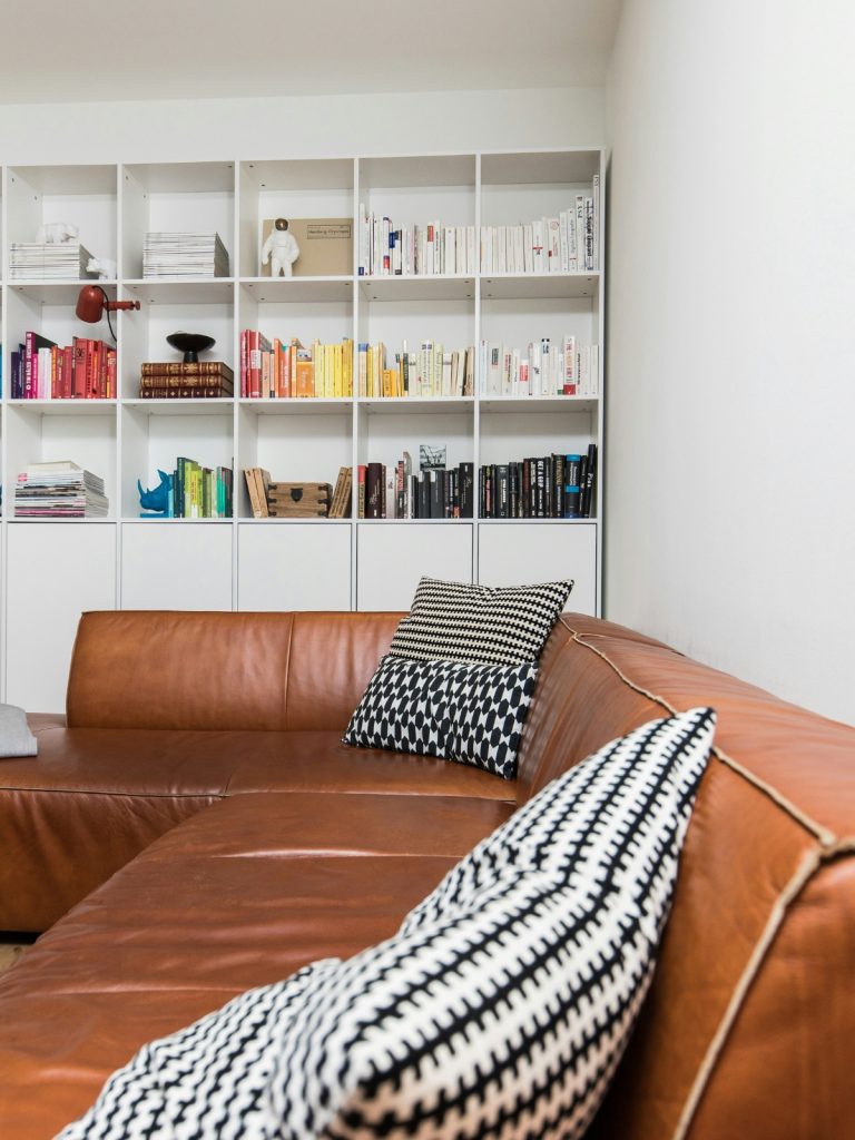 Modern storage-friendly coffee table with hidden compartments in a small living room