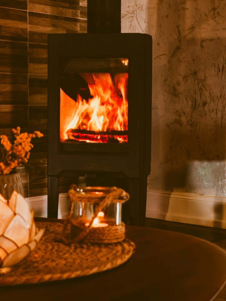 Modern living room with a styled fireplace mantel and cozy decor