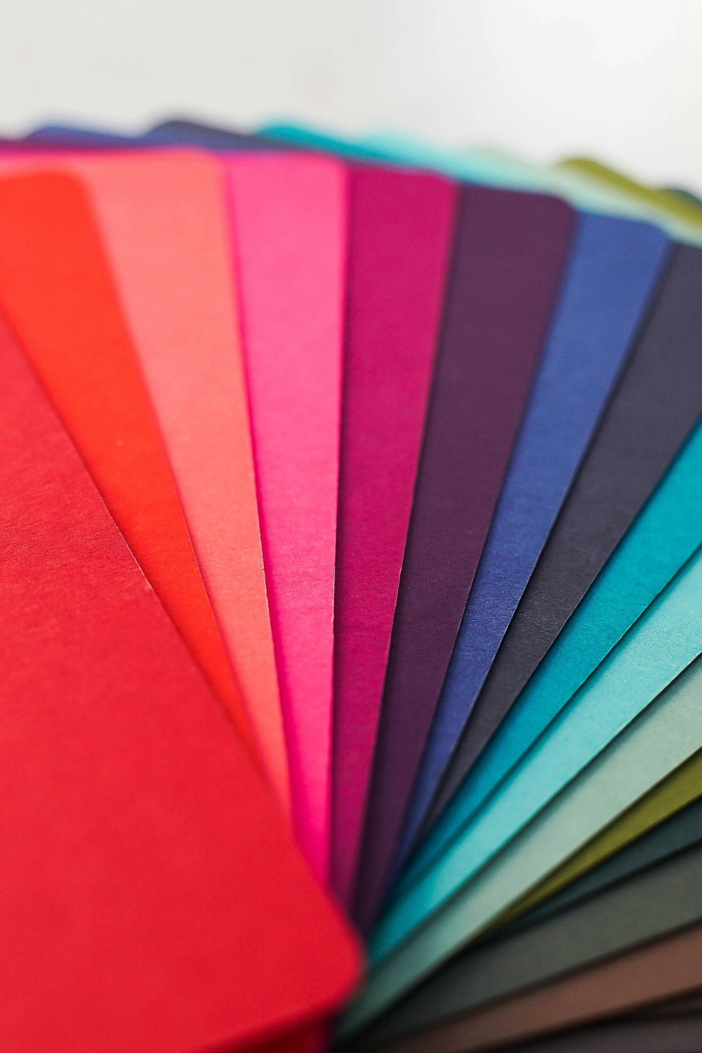 Living room with neutral, luxury-inspired color palette featuring cream walls and taupe accents