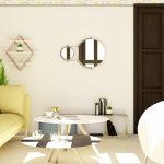 Monochrome living room styled with layered textures, warm lighting, and modern decor elements adding personality and depth