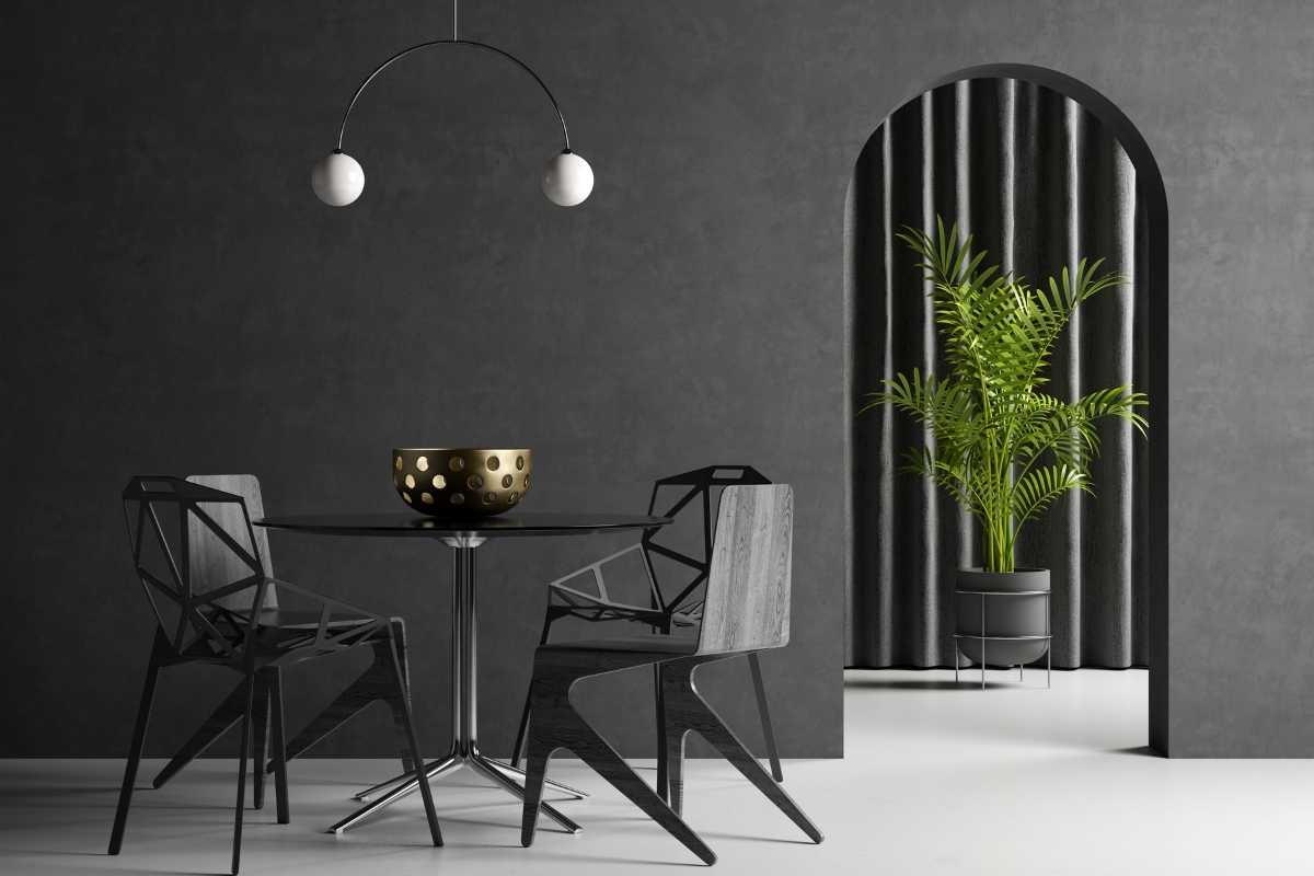 Living room featuring a metal-framed coffee table and chairs paired with wooden furniture and fabric cushions for a modern, layered look