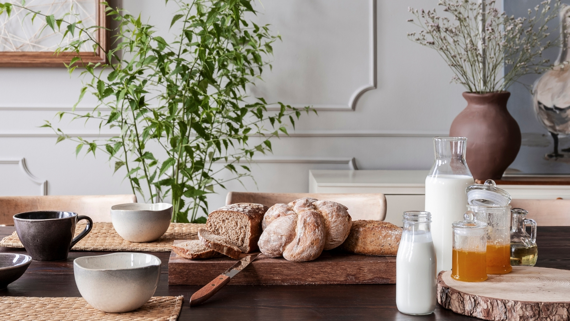 natural winter decororganic home accents cozy winter interiors Living room with natural winter accents like wooden trays, pinecones, and greenery