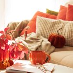 Cozy living room with autumn-inspired warm colors and fall décor