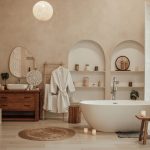 Spa-inspired bathroom design with neutral tones and natural materials