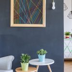 Vertical wood slat paneling in modern living room wall design 2026