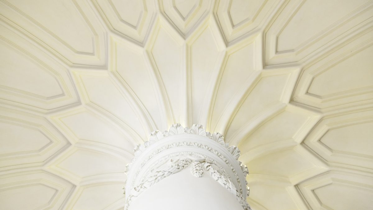 Colorful painted ceiling transforming modern living room