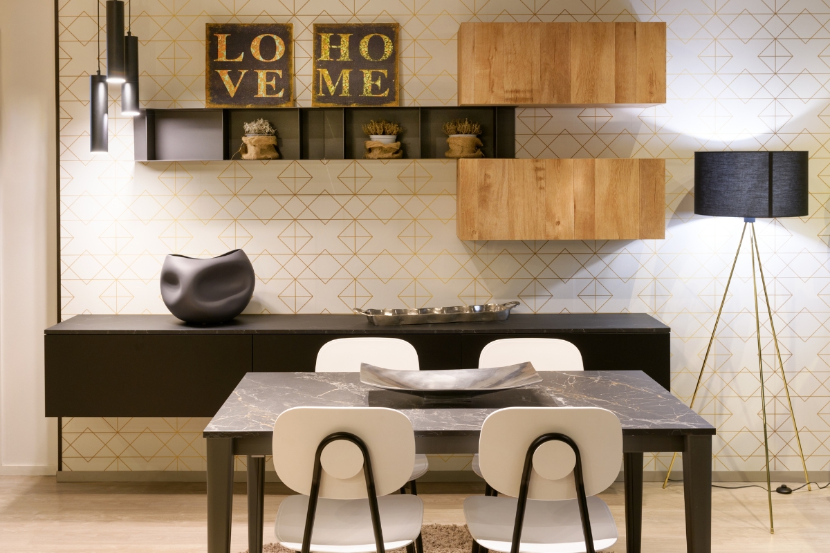 Space-saving dining furniture including compact table and slim chairs for small dining room