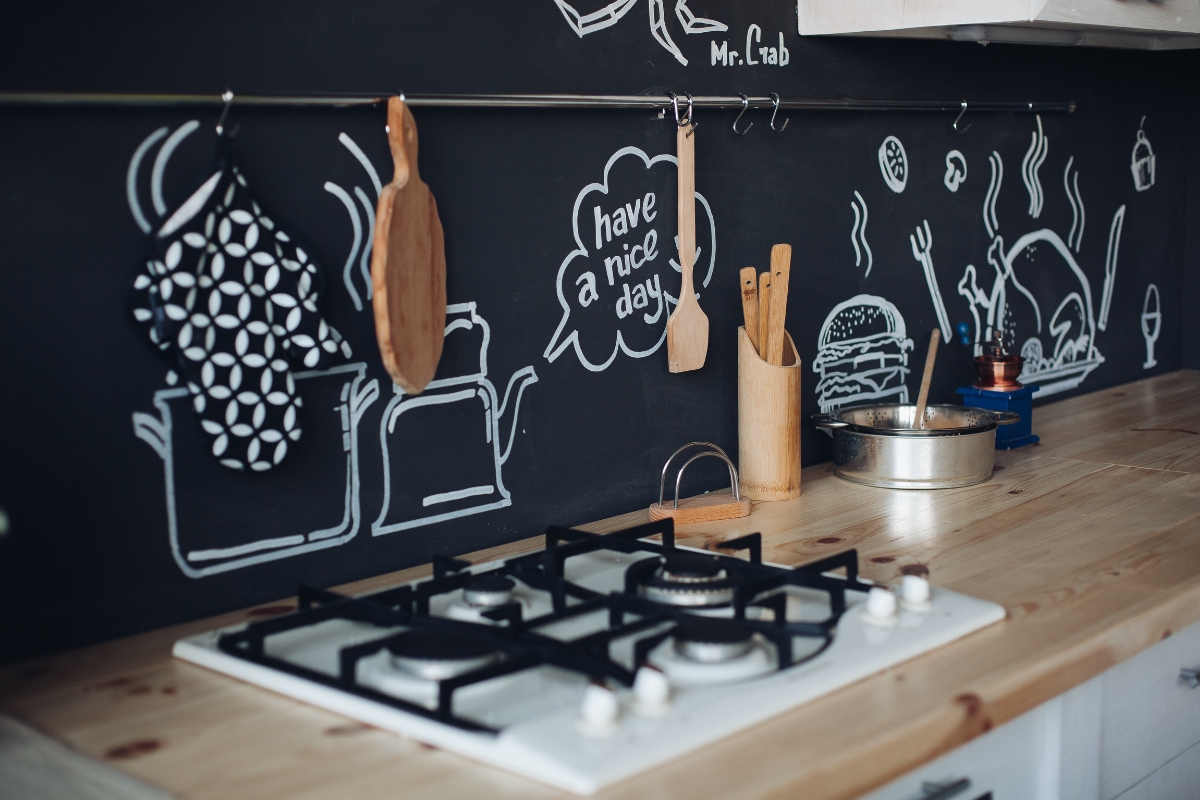 Modern kitchen styled with warm Scandinavian decor and open shelving