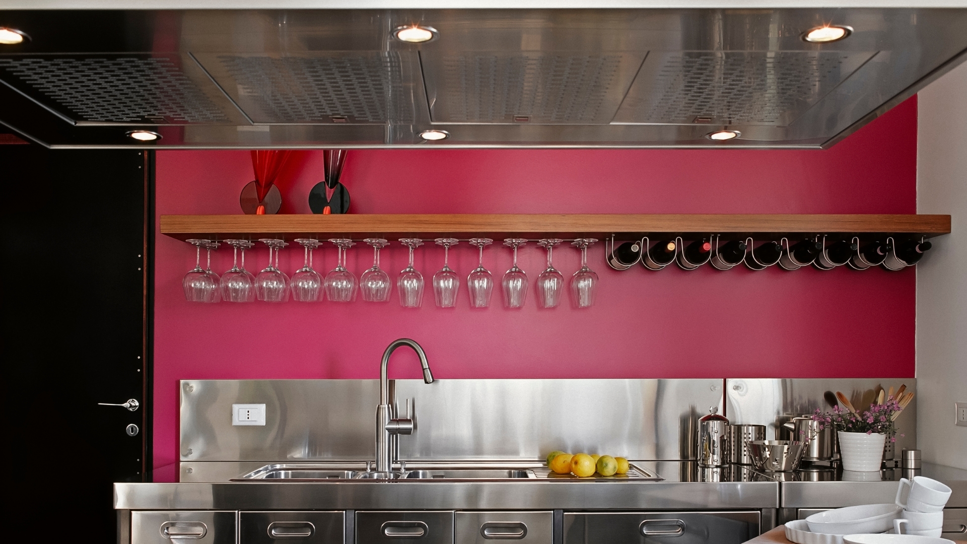 Modern kitchen with floating shelves and neatly styled dishware