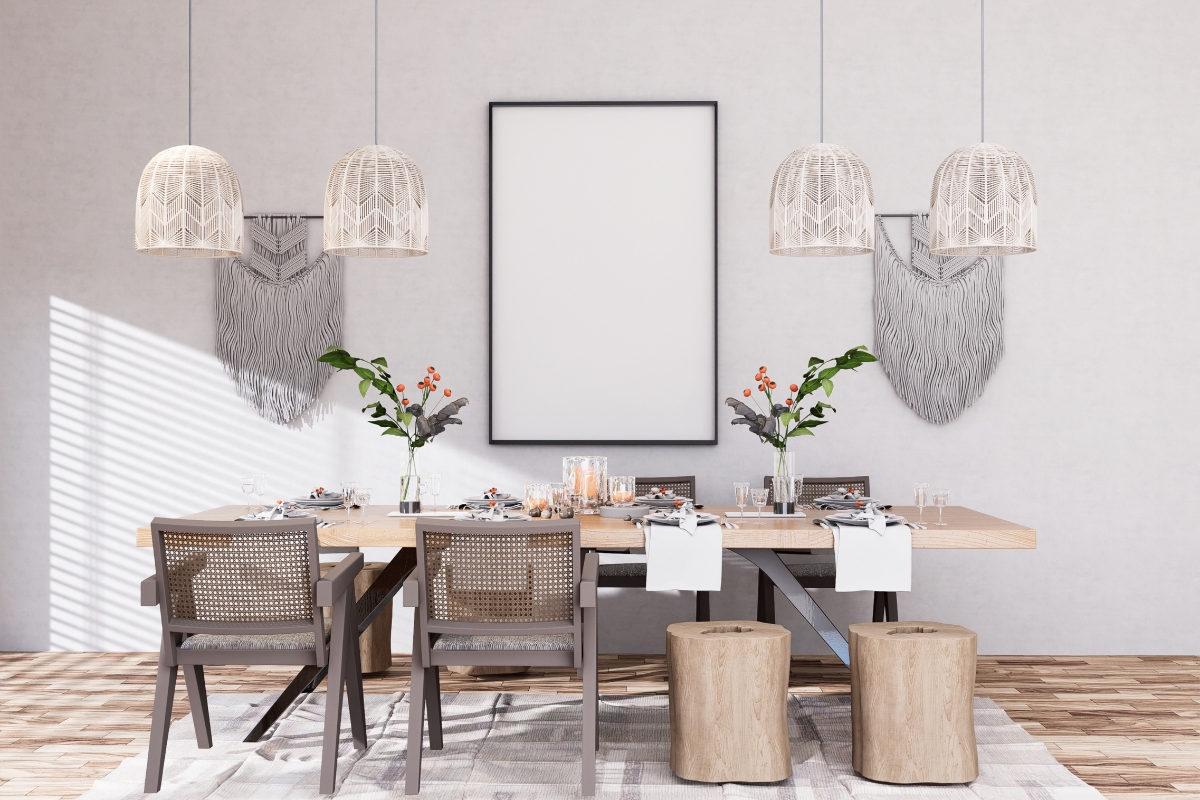 Clutter-free decorated small dining room with simple table styling and modern wall art