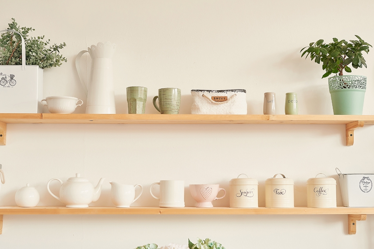 Modern floating shelves styled with decorative objects