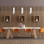 Minimal dining room with clean-lined wood table and modern upholstered chairs in neutral tones
