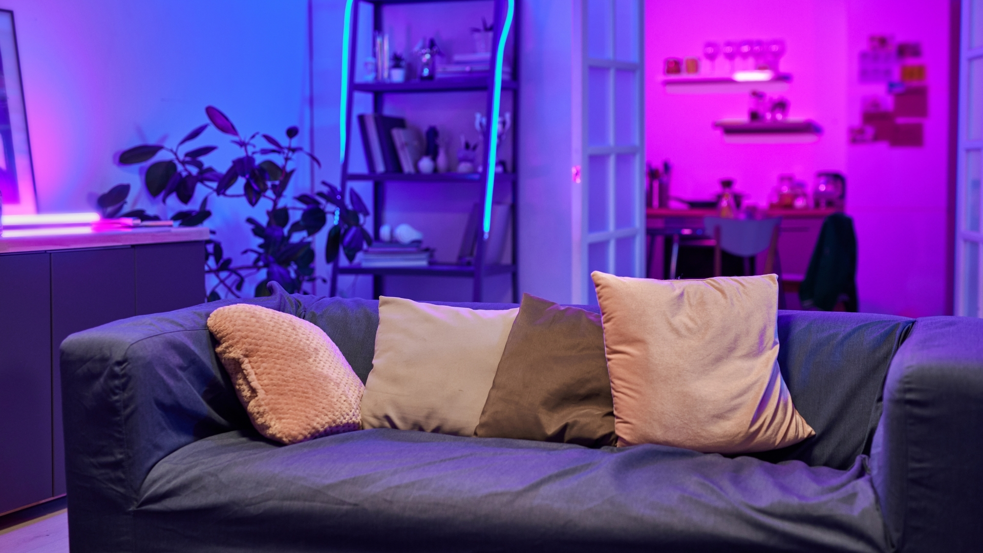 modern living room with layered smart lighting and ambient lamps