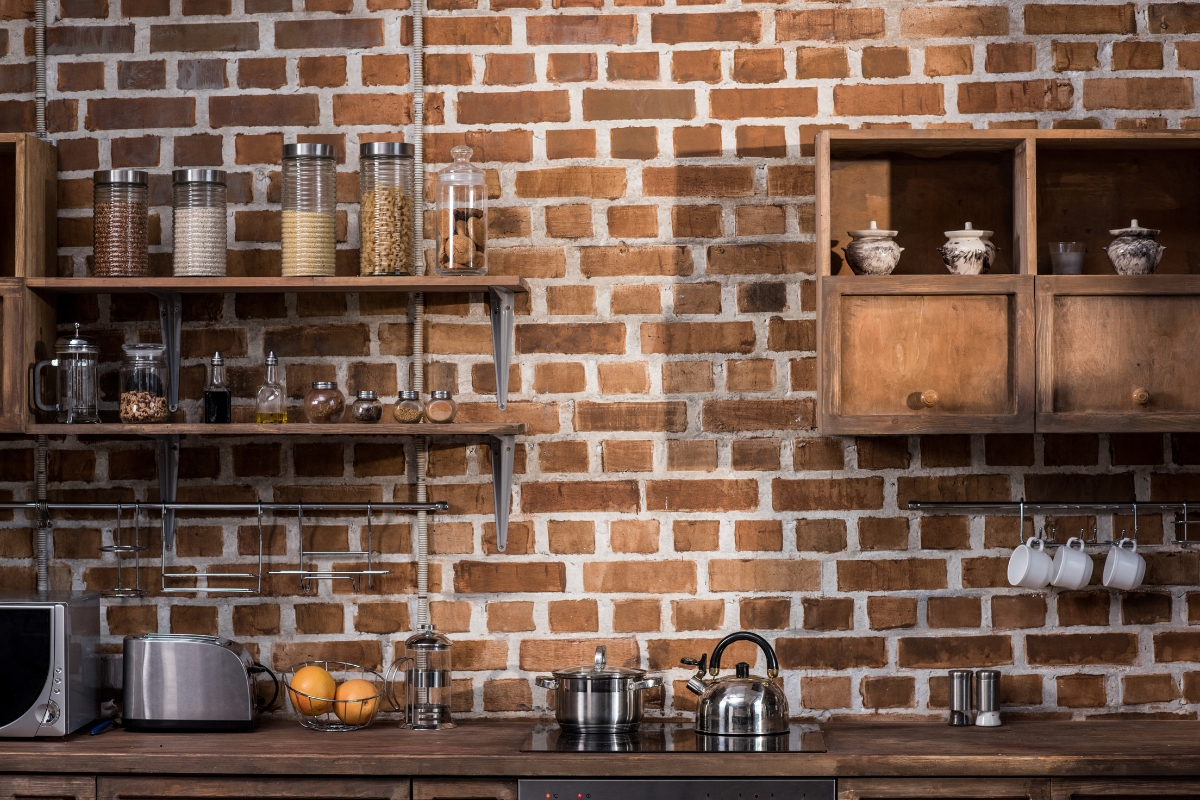 Modern kitchen wall with open shelving and decorative dishware