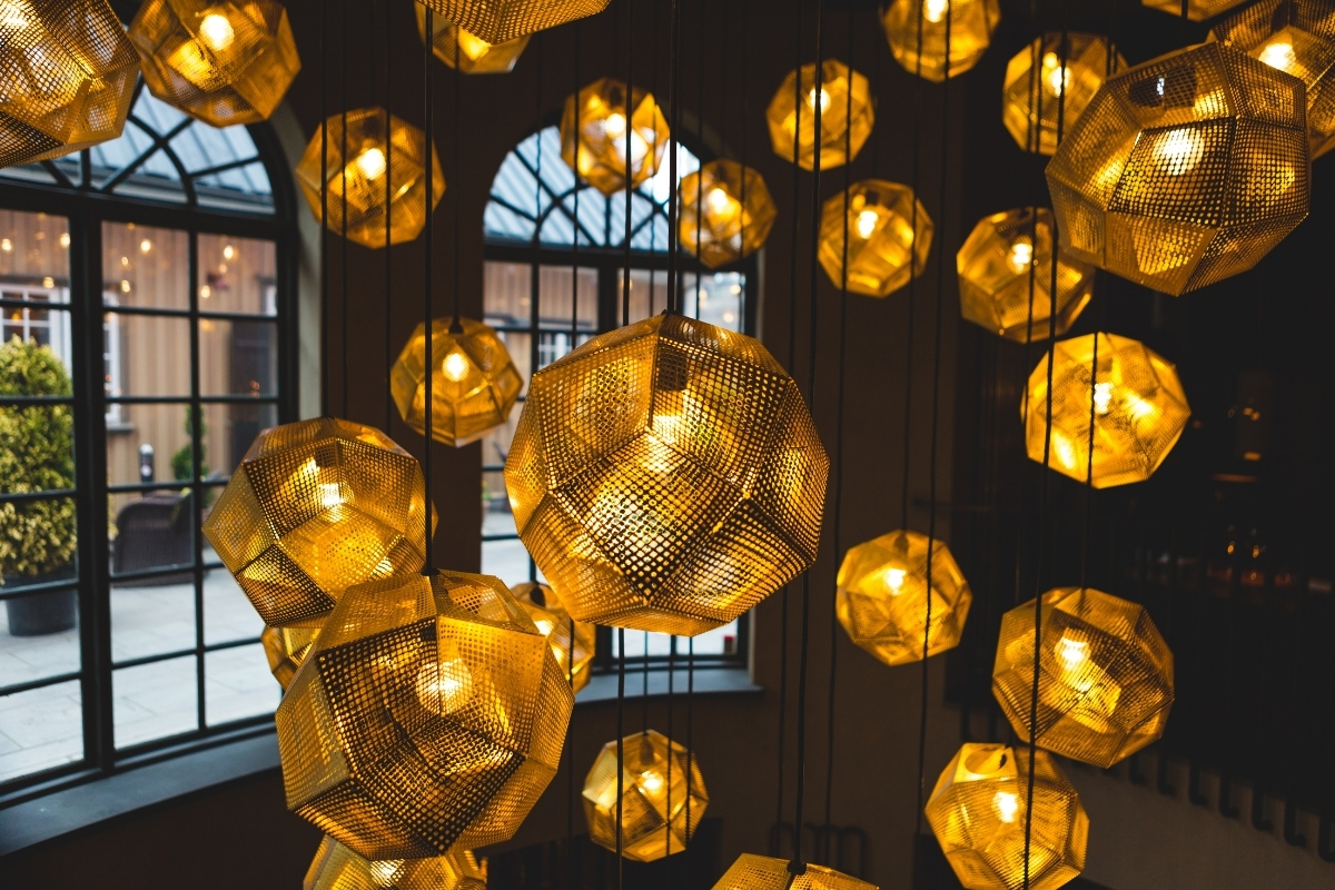 living room featuring layered lighting with ambient task and accent sources