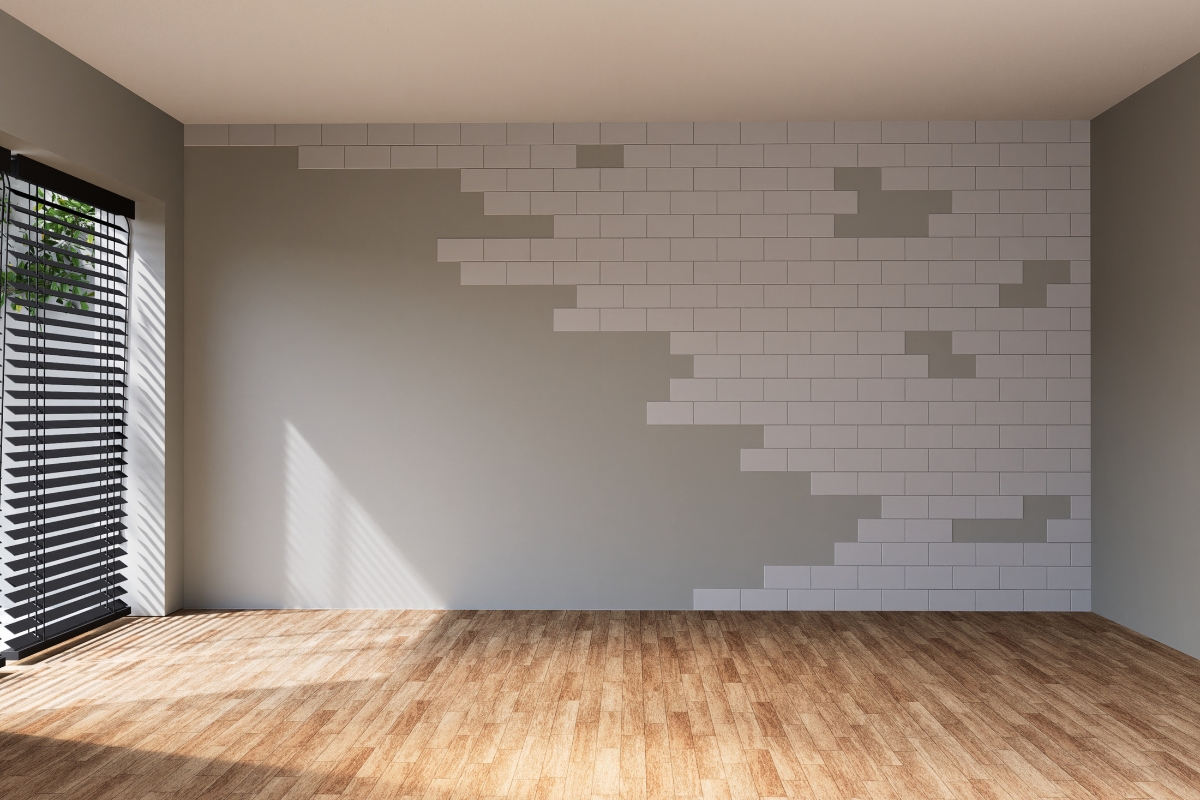 Layered wall with wooden slats, plaster texture, and floating shelves in modern living room 2026