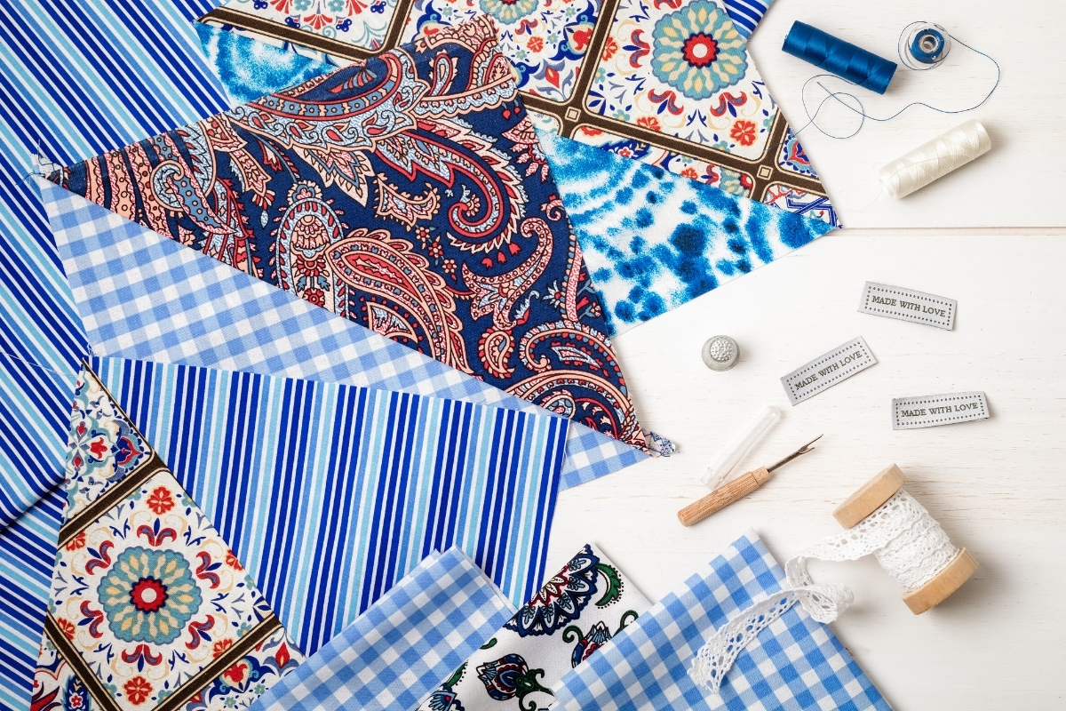Summer living room with light linen curtains and cotton cushions