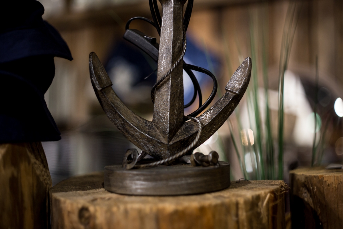 Emerald green velvet sofa as the anchor piece in a modern cozy living room