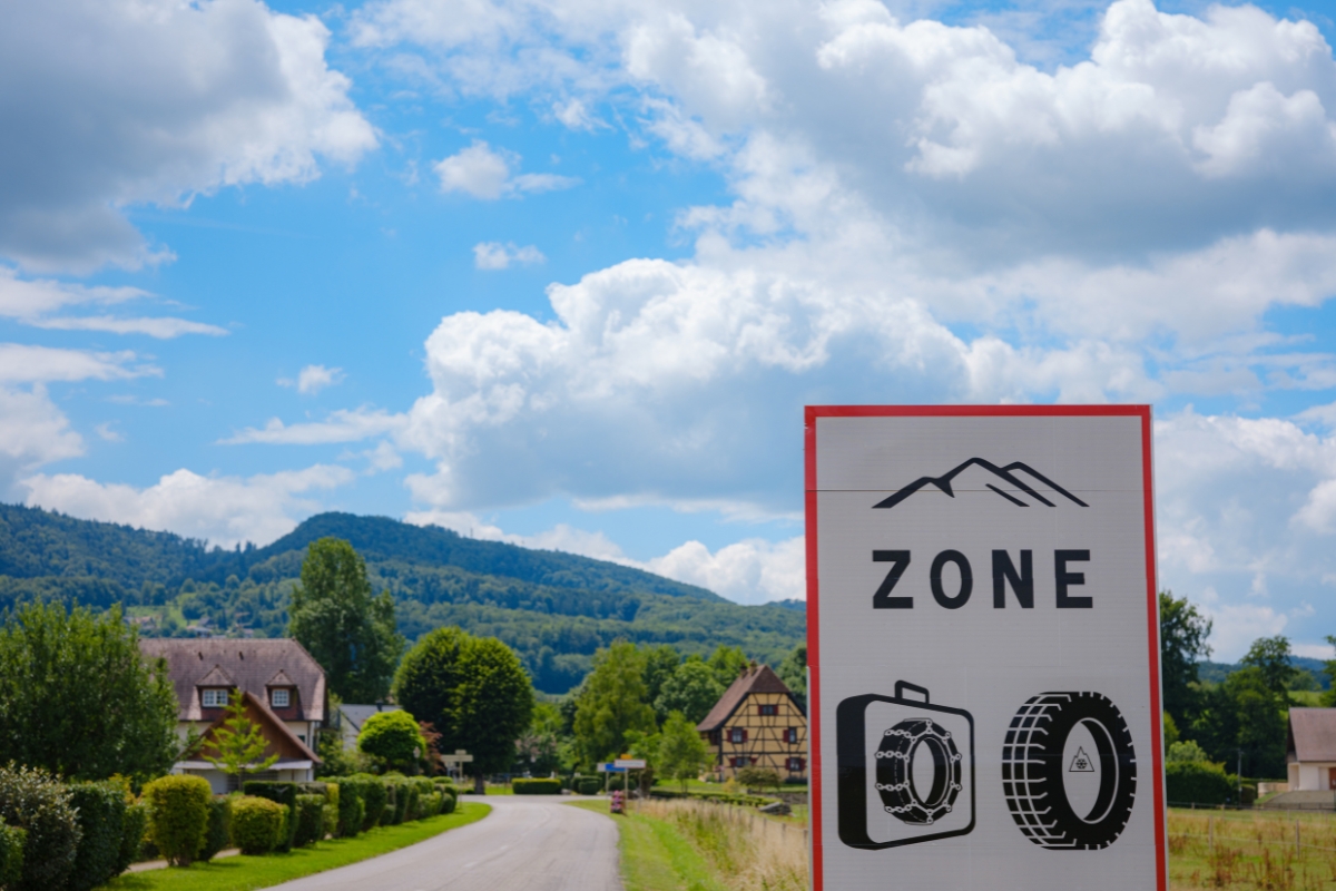 Spring entryway styled with greenery, baskets, and seasonal accents for a fresh look