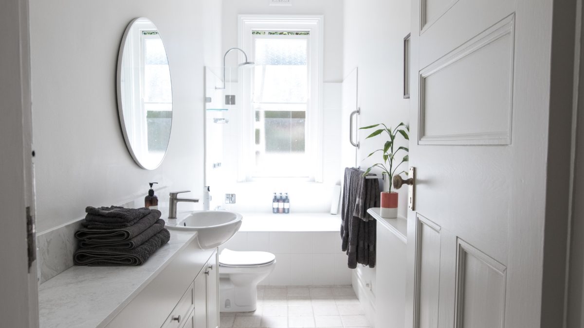 Small modern bathroom upgraded with smart storage, minimalist decor, and space-saving layout ideas