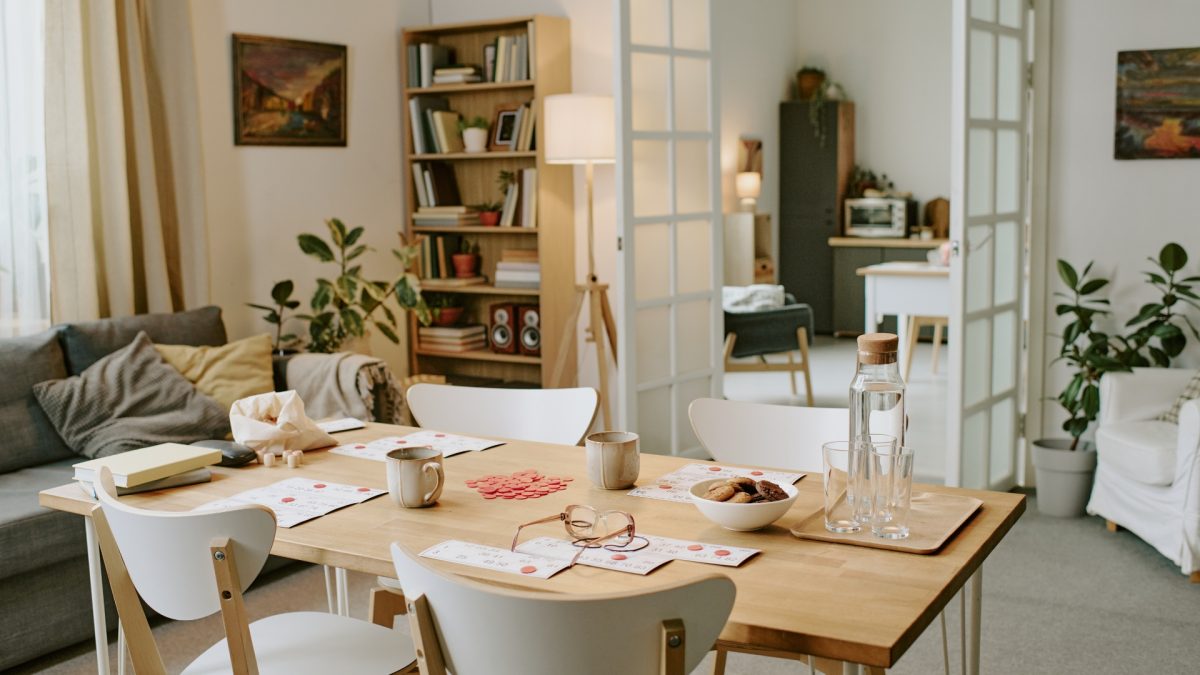 Compact dining room with smart layout, round table, and minimal chairs for small homes