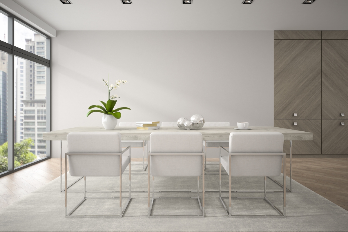 Clean minimal dining room with neutral color palette and simple wooden table