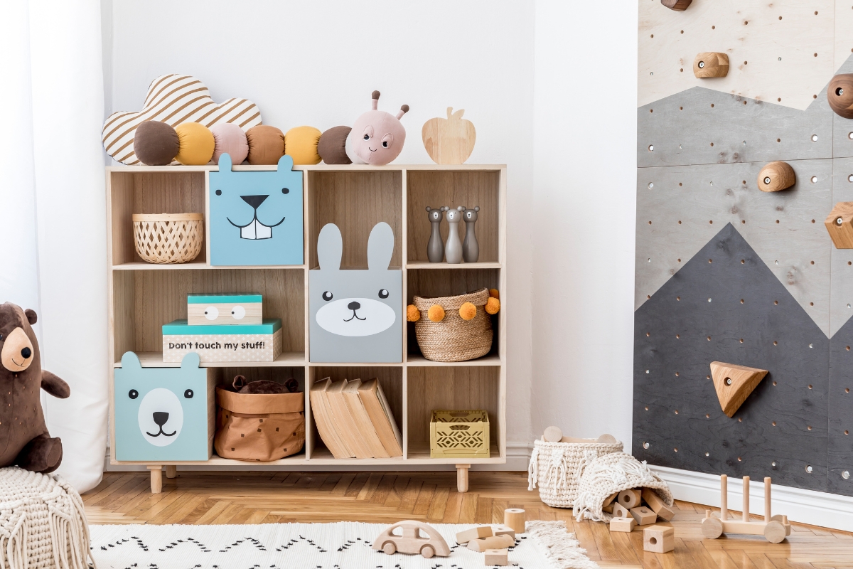 Kids room storage setup with labeled bins and open shelves