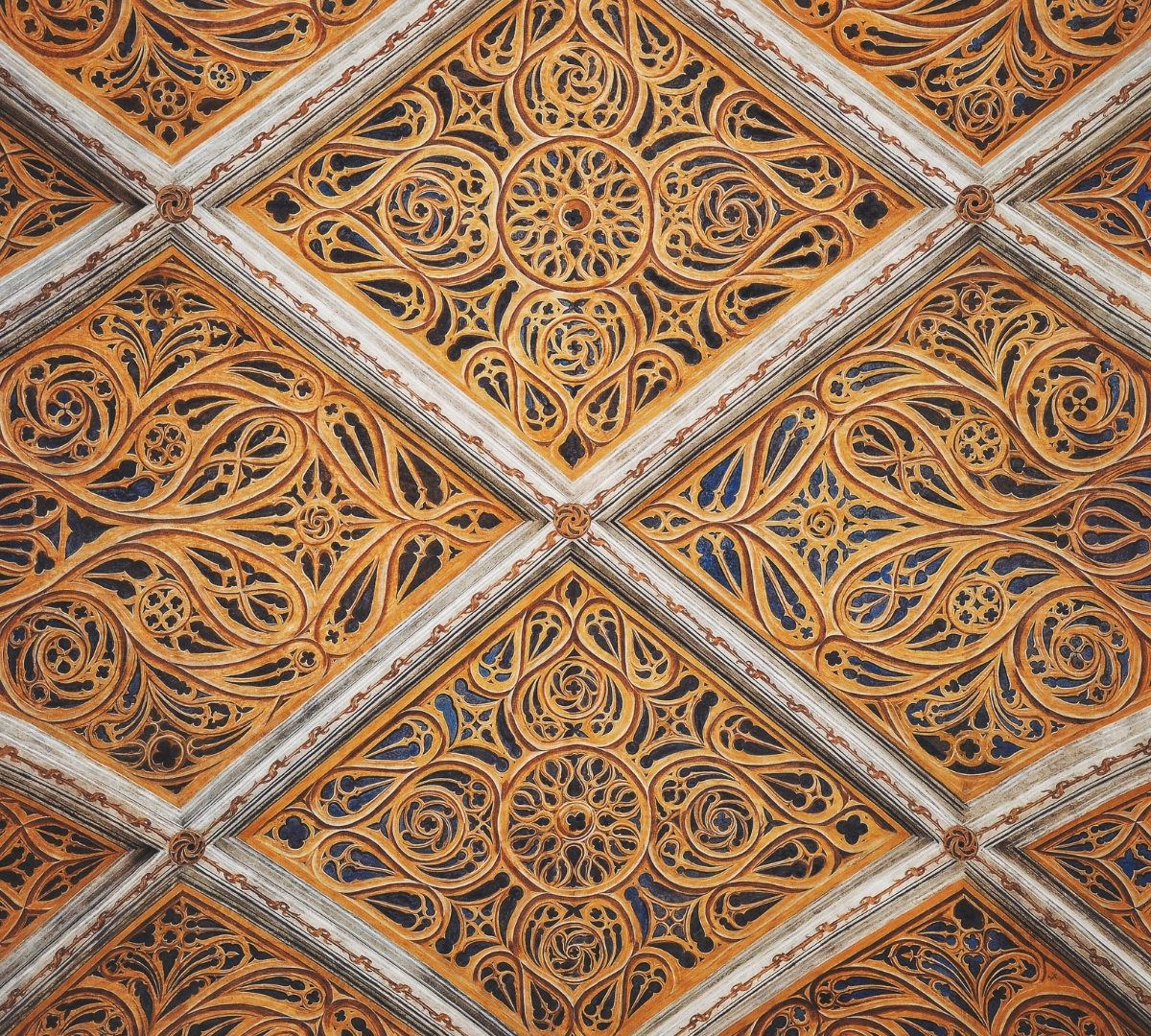 Modern room featuring a textured and layered ceiling design that adds architectural depth and visual interest