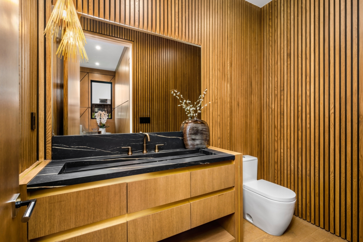 Modern bathroom with wood vanity and wood-look tile flooring