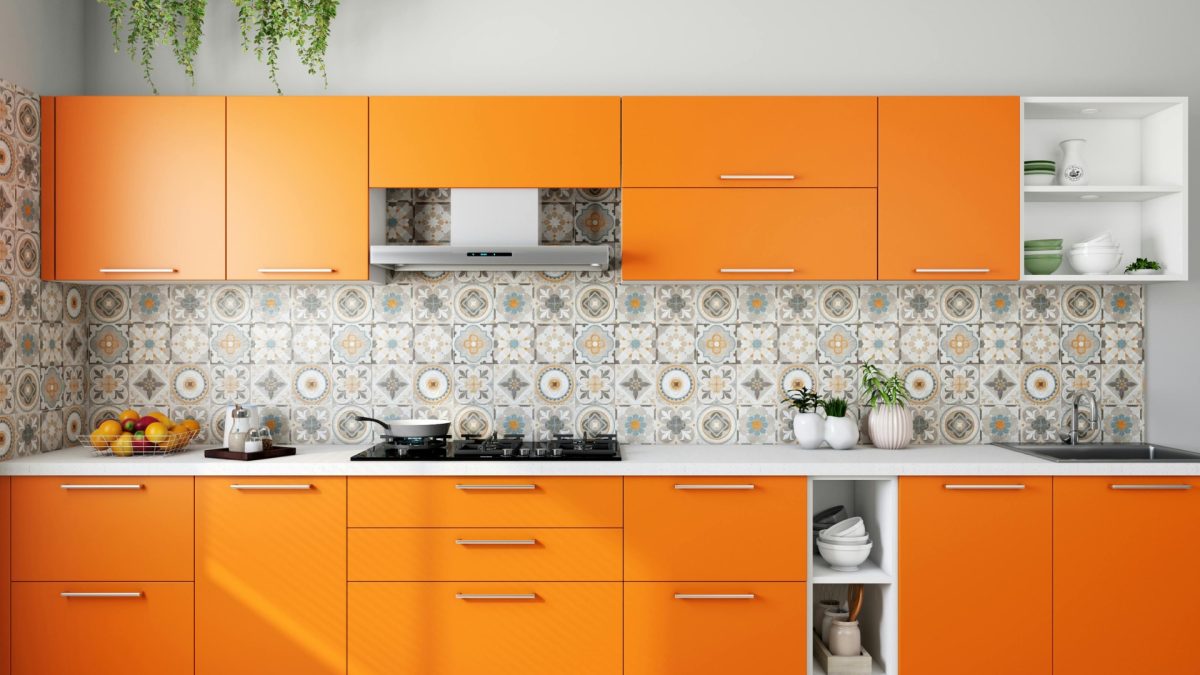Kitchen accent wall painted in bold color with patterned backsplash creating a stylish, modern, and visually striking kitchen interior