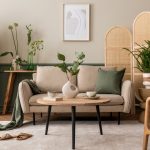 Biophilic living room with indoor plants, natural wood furniture, and modern neutral decor