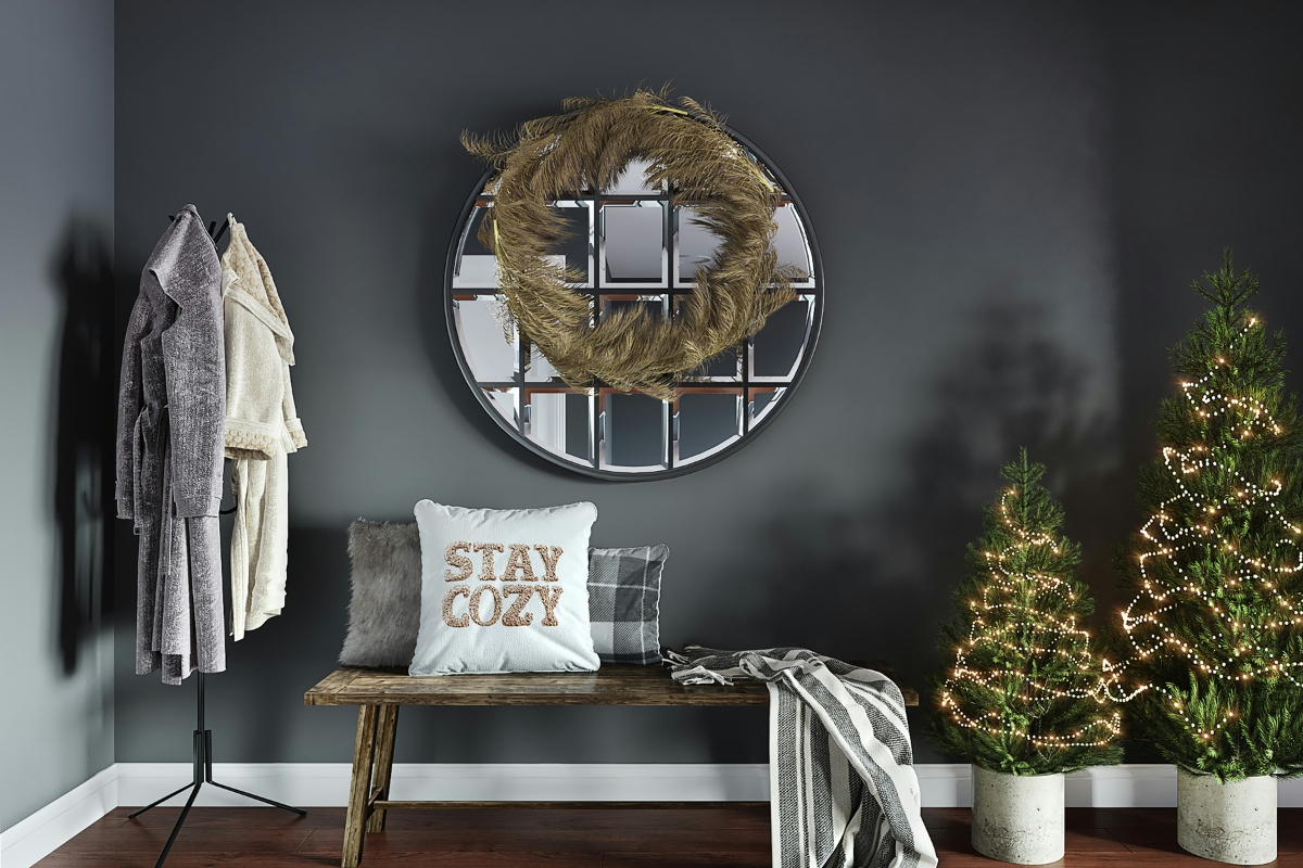 Winter living room with a calm color palette featuring soft neutrals, warm beige and grey tones creating an elegant and cozy atmosphere after holiday decorations.