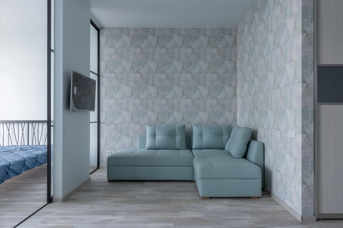 Minimalist living room wall painted in neutral tones with clean decor