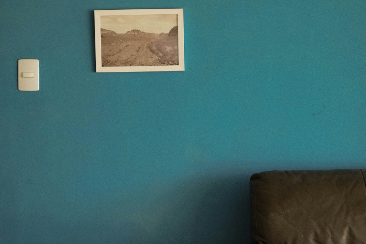 Modern living room wall chosen as the perfect spot for personalized photo gallery