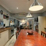 Comfort-first dining space with cushioned chairs and cozy lighting for long meals