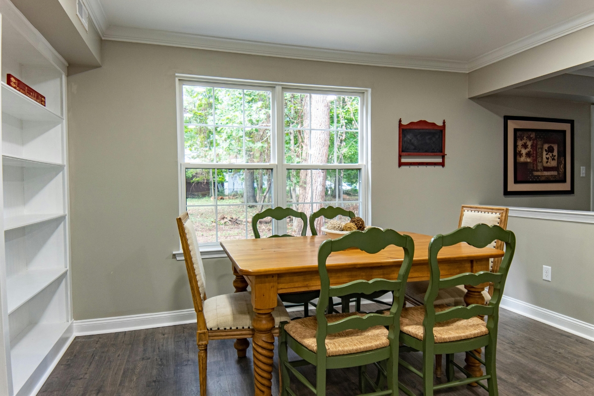 Open-concept dining room with cohesive color palette creating visual flow