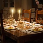 Curved dining table with soft edges and modern chairs in a cozy dining room