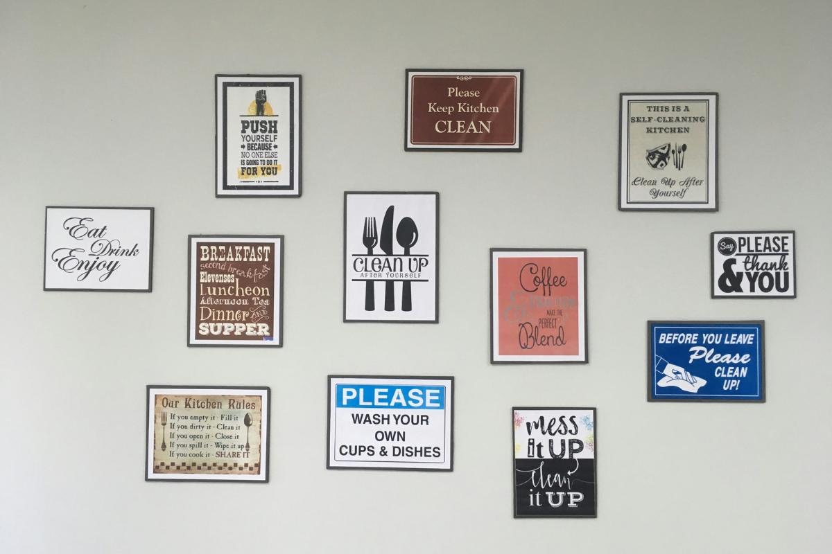 Framed family photos displayed as personalized wall decor in a living room