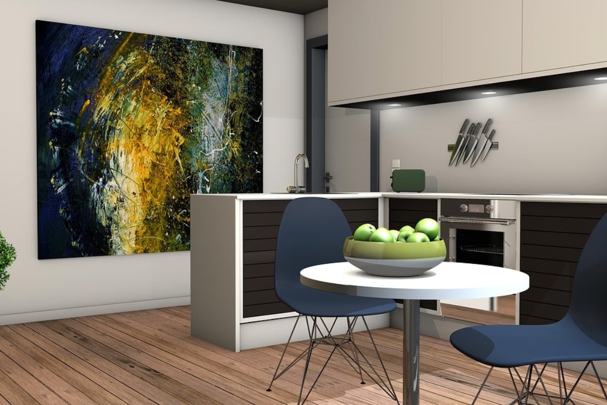 Modern dining room with statement pendant lighting designed for functional use and everyday lifestyle, above a wooden dining table.