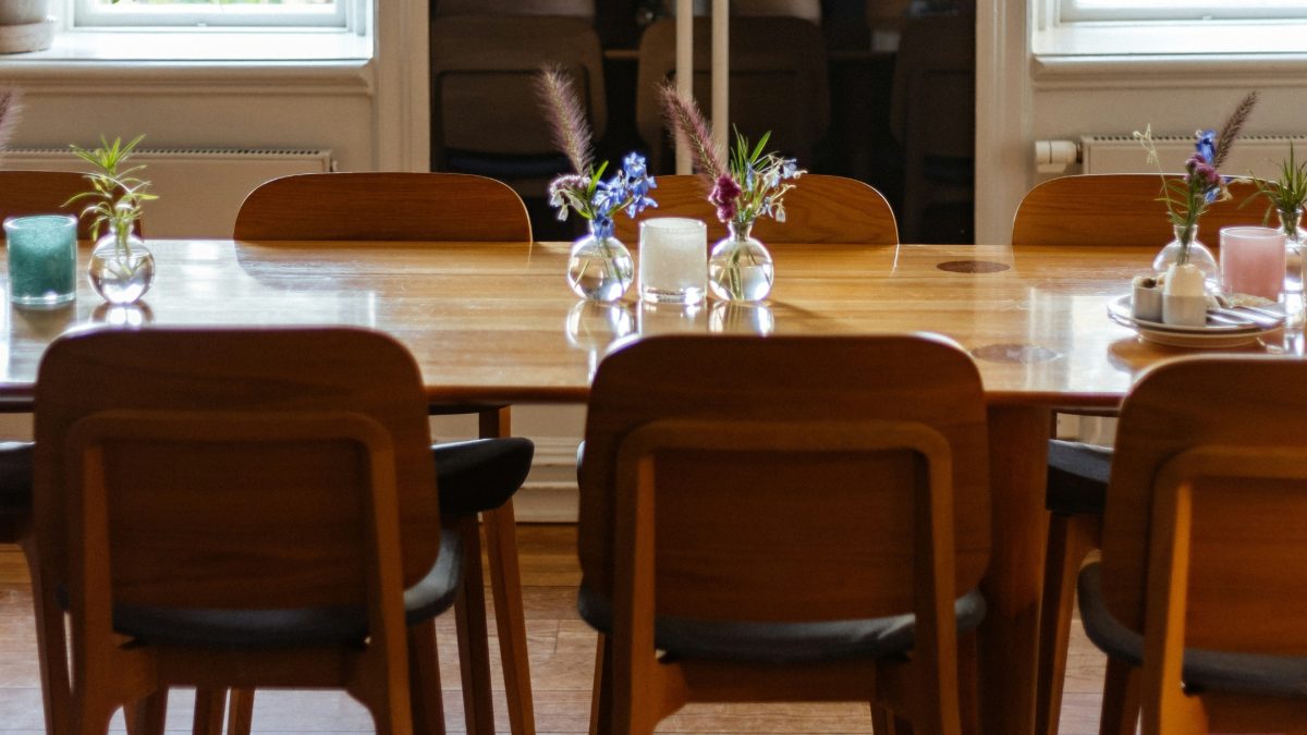 Dining room statement piece with bold chandelier and balanced modern decor