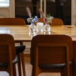 Dining room statement piece with bold chandelier and balanced modern decor